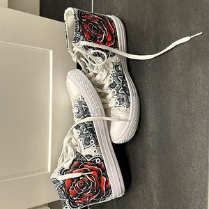 RAAD high top size 8 women and 6 1/2 men. spray-painted red flower details